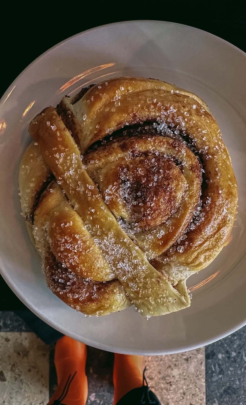 Cinnamon bun on a plate in Tromsø, Norway