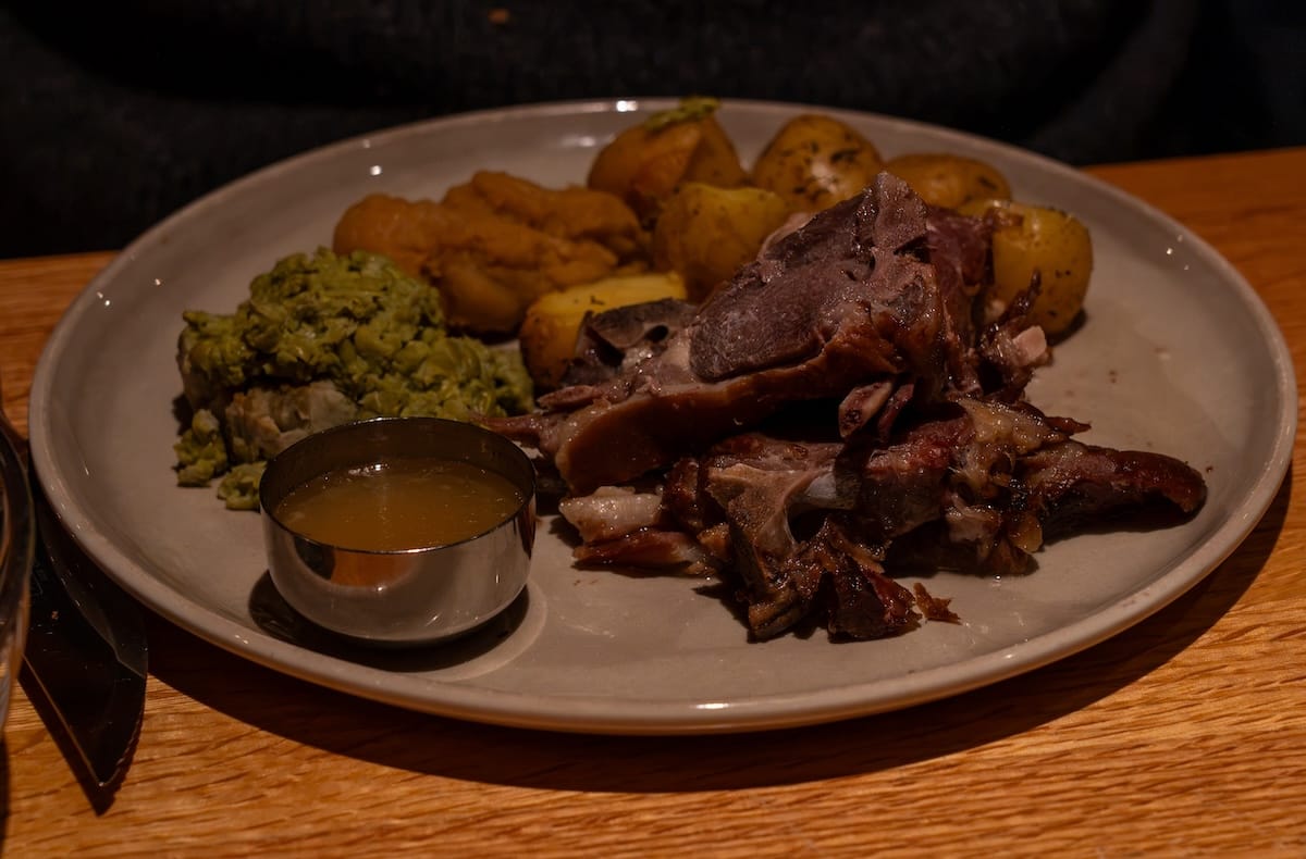 Christmas food at Skarven Kro
a plate with Norwegian lamb, potatoes, and more on it
