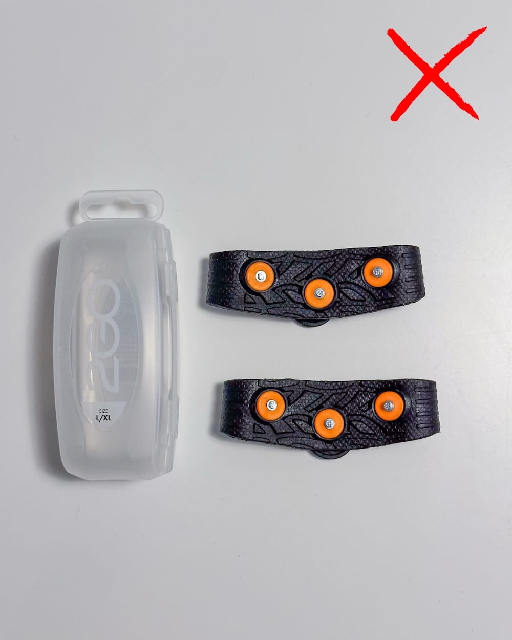 Studs that go over shoes laid on a table