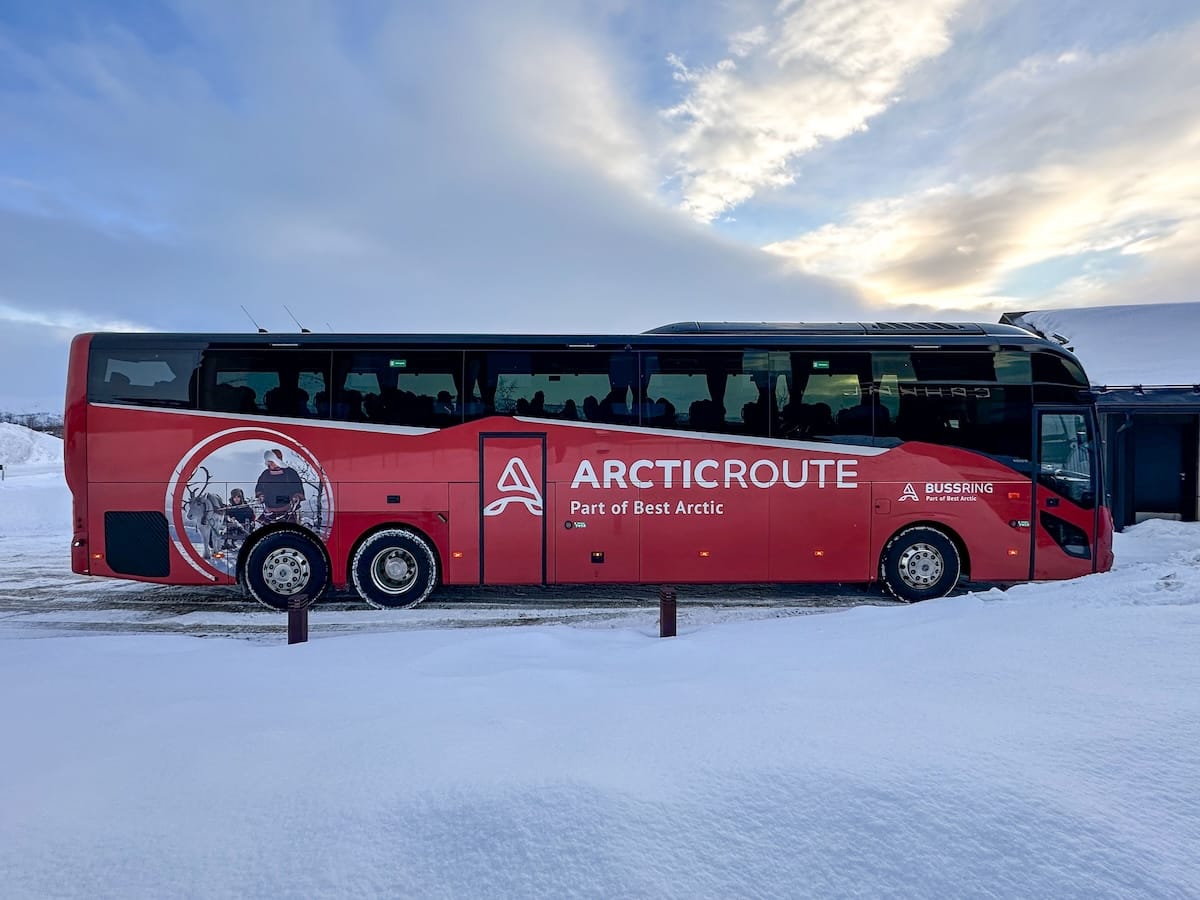 How to get from Tromsø to Rovaniemi (4 ways)

a red bus in the middle of the arctic between tromsø and rovaniemi